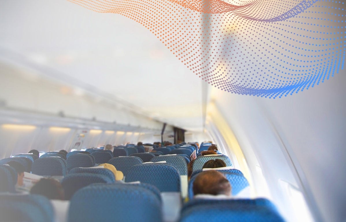 People sitting inside an airplane.